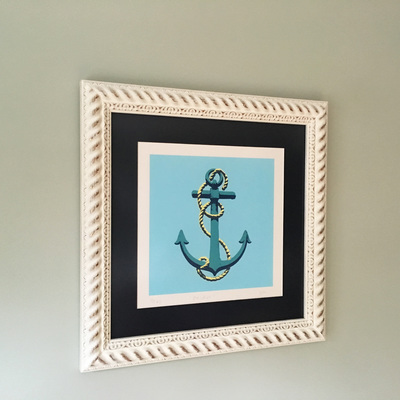 This white and gold 'rope' frame sets off this colourful screenprint of an anchor and rope.