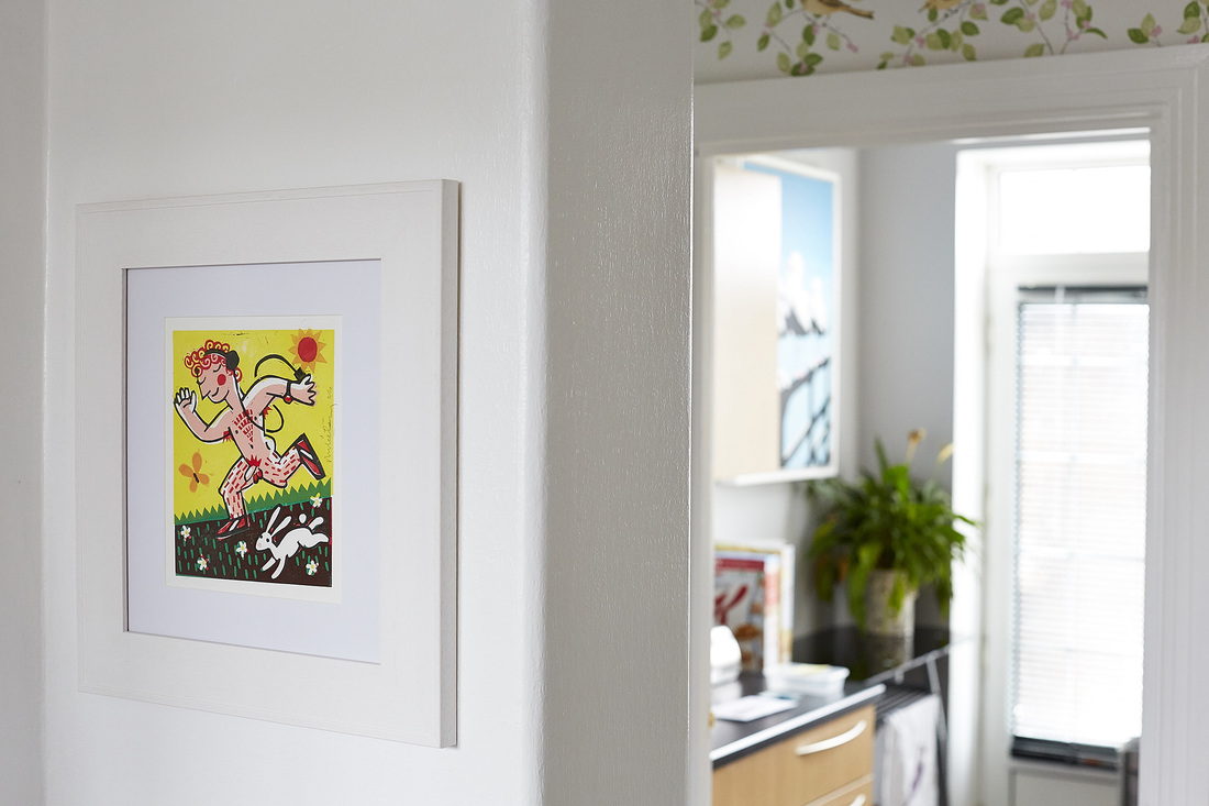 This colourful print was framed with a simple white mount and frame, with anti-reflection glass to show it at its best.