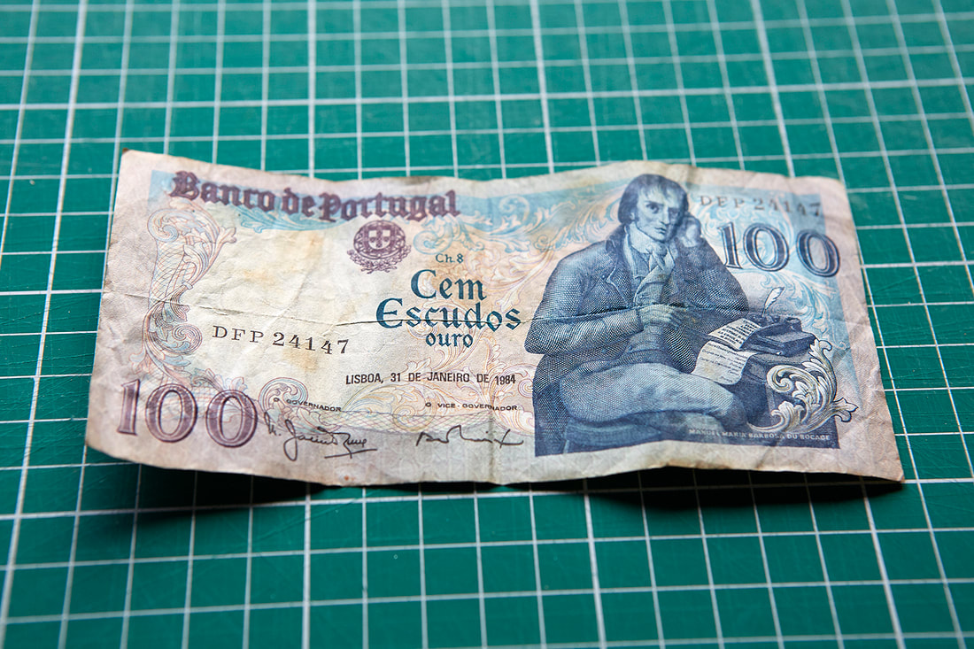 The original state of the one hundred escudos note.